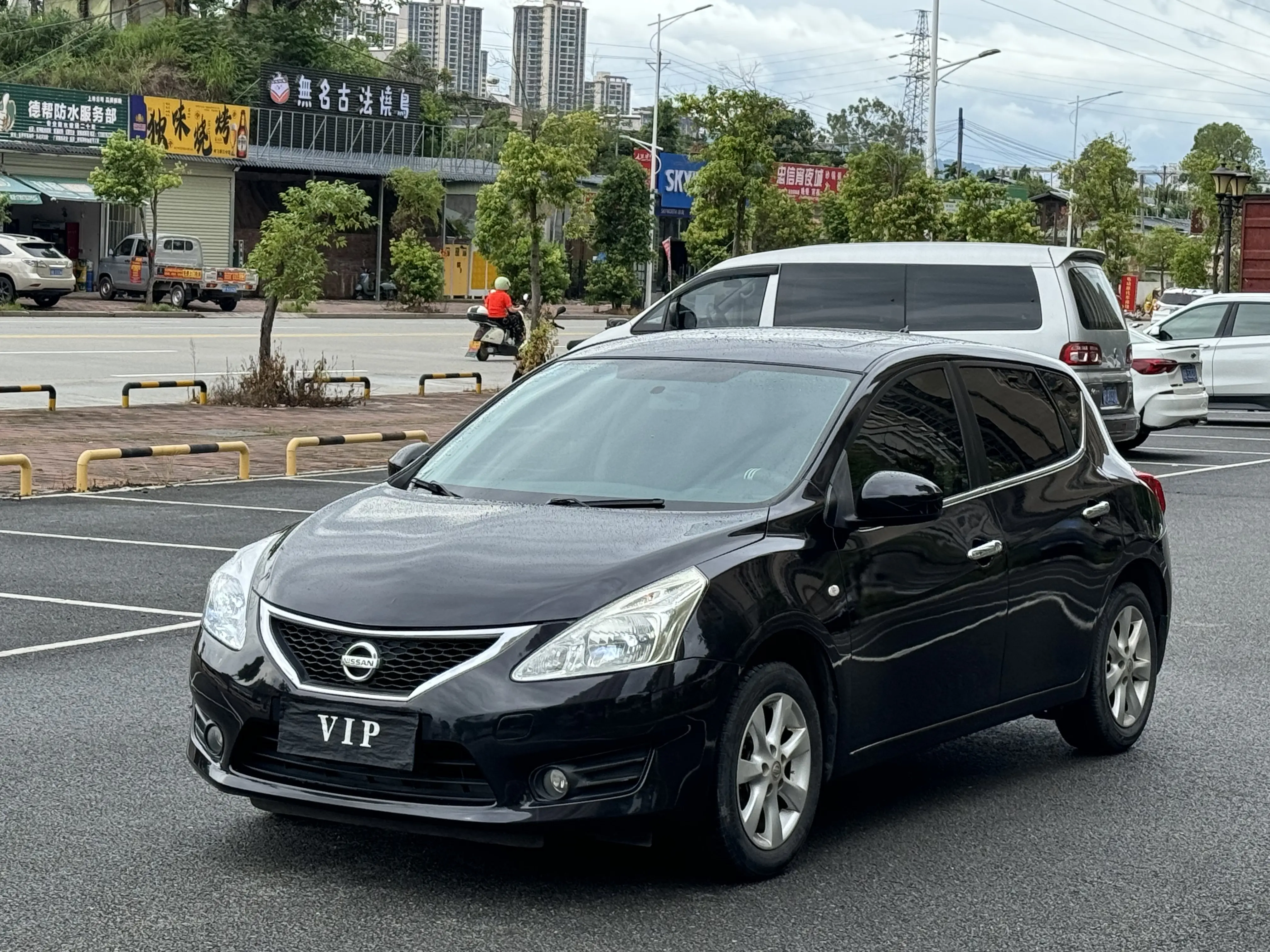 Nissan Tiida I Рестайлинг